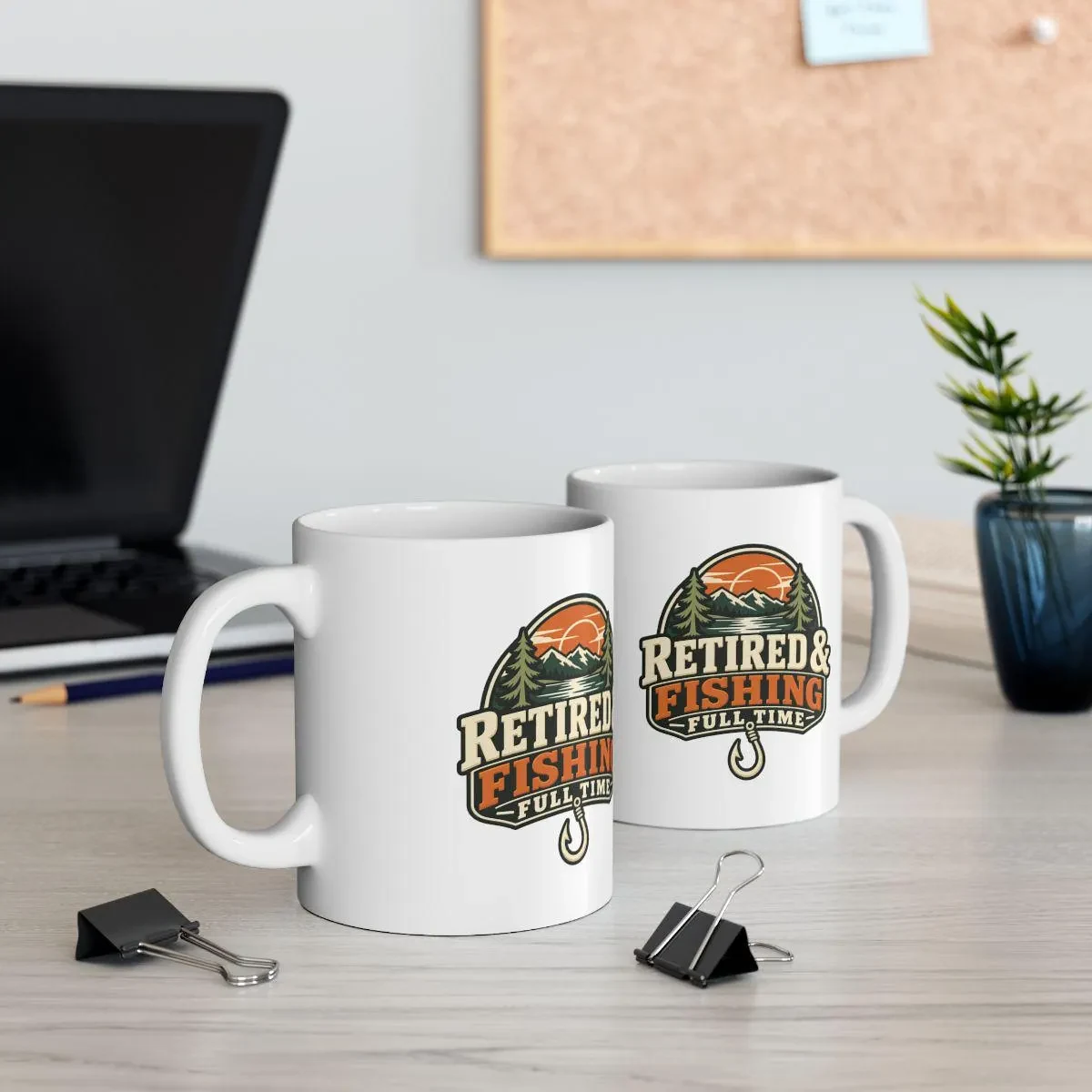 Two Retired and Fishing Full Time mugs on a desk
