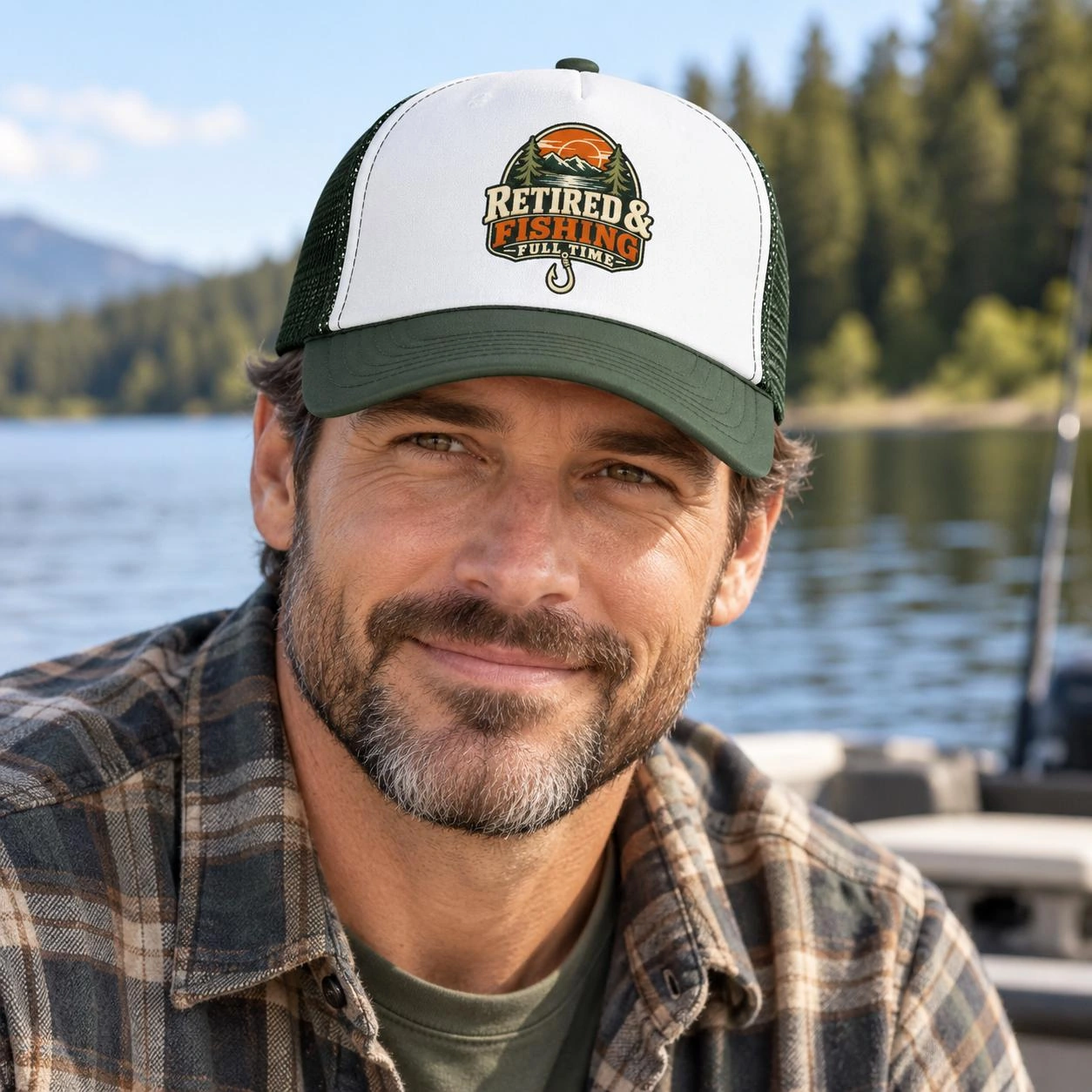 Man wearing the Retired and Fishing Full Time trucker hat by a lake